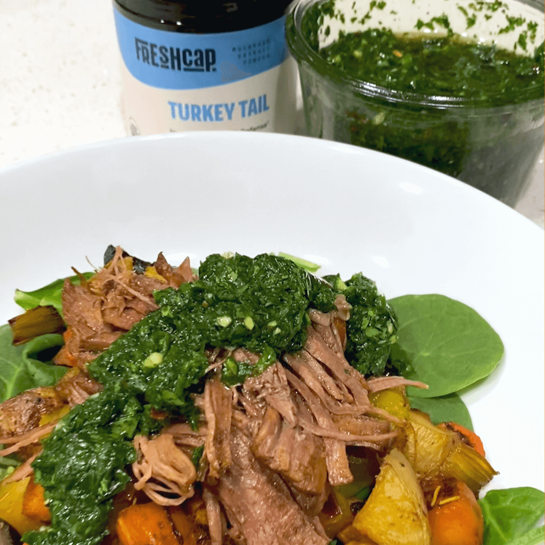 Turkey Tail Chimichurri on a bed of beef and vegetables.